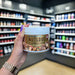Close-up of (Allnutrition Nutlove 500g) held up inside My Supplement Shop, clearly showing the front label in a Sports Nutrition setting.
