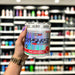 Close-up of (OxyShred Ultra Concentration 60 Servings) held up inside My Supplement Shop, clearly showing the front label in a Sports Nutrition setting.